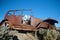 A deserted car with a cow skeleton driving in the Great Basin National Park, Nevada