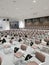 deserted conference room with empty chairs brown chairs alert monitor white press center