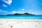 Deserted coral island on the horizon