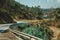 Deserted curve road through hilly landscape