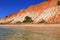 Deserted golden sandy beach in Olhos de Agua, Albufeira, Algarve, Portugal.