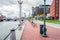 Deserted harbourside footpath on an overcast autumn day