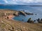 A deserted, inaccessible beach on the island of Muckle Roe on Shetland, UK - even on this remote beach, plastic refuse can be seen