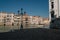 Deserted marina in Venice and a passing lonely boat, Italy