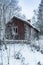 Deserted old timber house wintertime Sweden