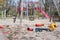 Deserted playground in a city park with broken kids toys during COVID-19 lockdown
