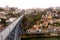 Deserted Ponte Dom Luis I bridge in Porto on rainy, foggy day