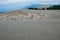 Deserted sandy beach with clean fine sand at sunrise