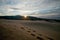 Deserted sandy beach with clean fine sand at sunrise