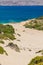 Deserted sandy beach leading to a clear, blue ocean Psili Ammos, Crete, Greece