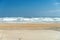 Deserted shore, waves and sky of the Atlantic Ocean