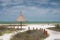 Deserted tropical beach with natural umbrella