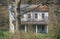 Deserted two-story clapboard home