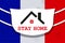 Design with abstract silhouette of the coronavirus of the flag of France and the roof of the house. Sign of COVID-2019.