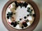 Design cake with white cream and blueberries