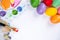 Design concept - Preparing for Easter celebration, painting Easter eggs with colorful Acrylic pigment color dyestuff in palette,