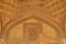 A design inside of bara gumbad monument at lodi garden or lodhi gardens in a city park from the side of the lawn at winter foggy