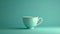 Design a visually striking image of a flawless tea cup, the embodiment of perfection against a solid color background. Ensure the