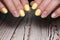 design on yellow manicure