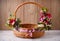 Designer basket is decorated with flowers. Wicker basket for celebrating Easter and other holidays.