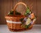 Designer basket is decorated with flowers. Wicker basket for celebrating Easter and other holidays.