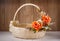 Designer basket is decorated with flowers. Wicker basket for celebrating Easter and other holidays.