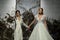 Designer Madeline Gardner and model walk the runway  during the Morilee by Madeline Gardner Spring 2020 bridal fashion show