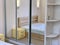 Designer wardrobe with a mirror in the bedroom