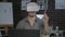 Designer wearing vr goggles. Programmer using vr glasses in dark office