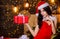 Desirable Santa girl. Gift for adults. Sexy gift. Sex shop. Attractive girl in erotic lingerie hold gift box. Woman with