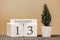 Desk calendar for use in different ideas. Winter month - January and the number on the cubes 13. Calendar of holidays on a beige