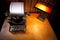 Desk with old typewriter and lamp