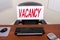 Desk and Vacancy Sign