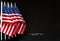 Desktop flags of USA on black background with copy space. Concept of the patriotic holidays