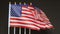 Desktop flags of USA flutter on black background. Concept of the patriotic holidays: presidents, mlk, independence, memorial,