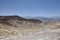 The desolate, barren, undulating landscape at Zabriskie Point in Death Valley National Park, California