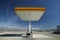 A desolate Shell Gas Station with a sign reading Self on it is located in Death Valley National Park near entrance, CA