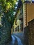 Desolate street with via and stone walls at San Giulio Island on Lake Orta Italy during a summer afternoon