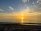 Desolate Turtle Beach on Florida\\\'s Gulf coast right before a beautiful pink and purple sunset on a winter day