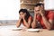 Despaired sad pensive young african american man and woman hold head with hands look at empty plates