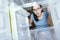 Desperate woman looking into her empty fridge