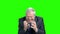 Desperate worried elderly businessman, green screen.