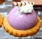 Dessert appetizers made with lavender covered ice cream on a cookie wafer