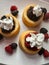 Dessert cakes with blackberries and raspberries