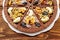 Dessert chocolate pizza with raisins and nuts