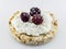 Dessert of crispbread, cottage cheese and juicy blackberries on a white background