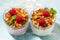 Dessert with granola, raspberry, fruit and natural yoghurt