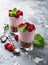 Dessert with granola, yogurt and raspberry