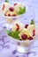 Dessert with pineapple ice cream, raspberries and meringue