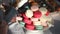 Dessert stand with colorful tasty macarons at wedding table. Birthday ceremony.